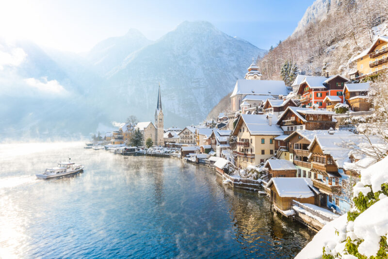 Snowy wedding scene in Hallstatt, Austria – winter lake view