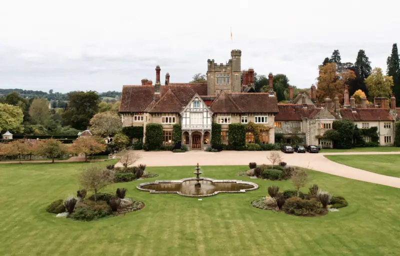 Elegant wedding ceremony at Cowdray House gardens