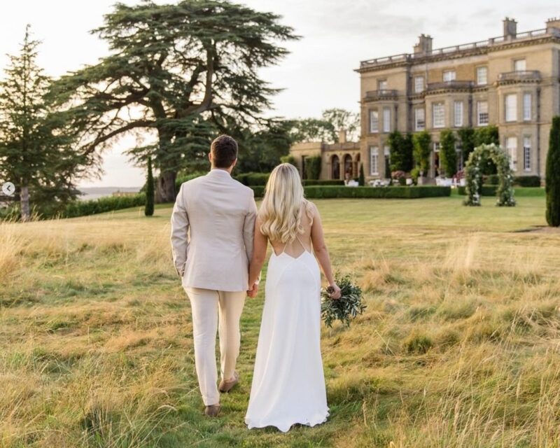 Bride and groom dancing to Celtic band during evening reception at Hedsor House